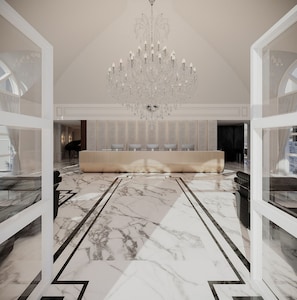 A spacious lobby with a marble floor, a large seating area, and a grand chandelier. - Gran Valley Resort - GAV Resorts (Gramado)