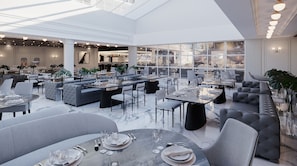 A spacious restaurant with high ceilings, modern furniture, and large windows. - Gran Valley Resort - GAV Resorts (Gramado)