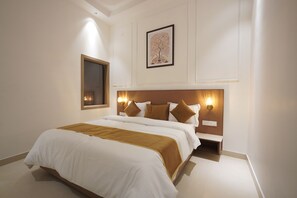 Premium Room | Desk, laptop workspace, blackout drapes, iron/ironing board - Nivaasa Hotel (Amritsar)