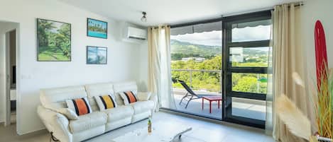 Comfort Apartment, Balcony, Mountain View | Living area | 130-cm LED TV with cable channels