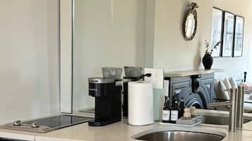 Fridge, stovetop, coffee/tea maker, cookware/dishes/utensils