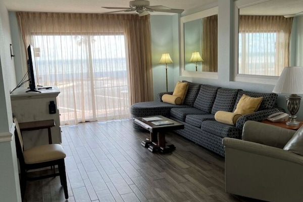 One Bedroom Two Bathroom Deluxe Oceanfront Suite | Living area | 50-inch flat-screen TV with cable channels, DVD player