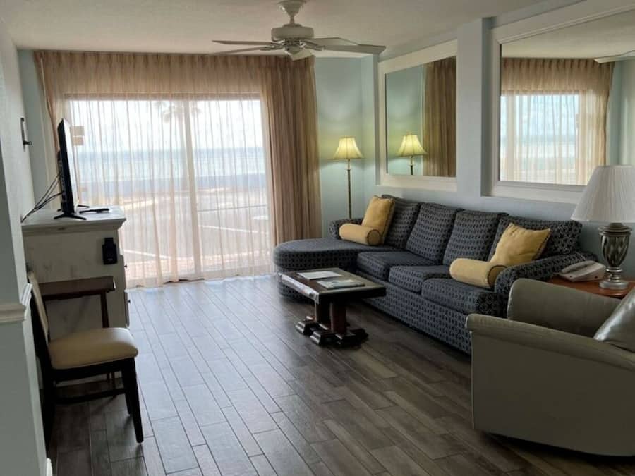 One Bedroom Two Bathroom Deluxe Oceanfront Suite | Living area | 50-inch flat-screen TV with cable channels, DVD player