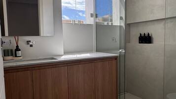 Shower, hair dryer, towels, soap