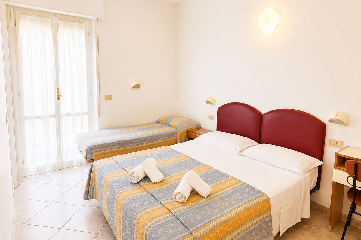 Standard Triple Room, Balcony | WiFi (free), bed sheets
