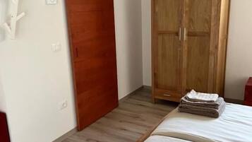 Standard Quadruple Room, Patio, Park View | In-room safe, soundproofing, free WiFi