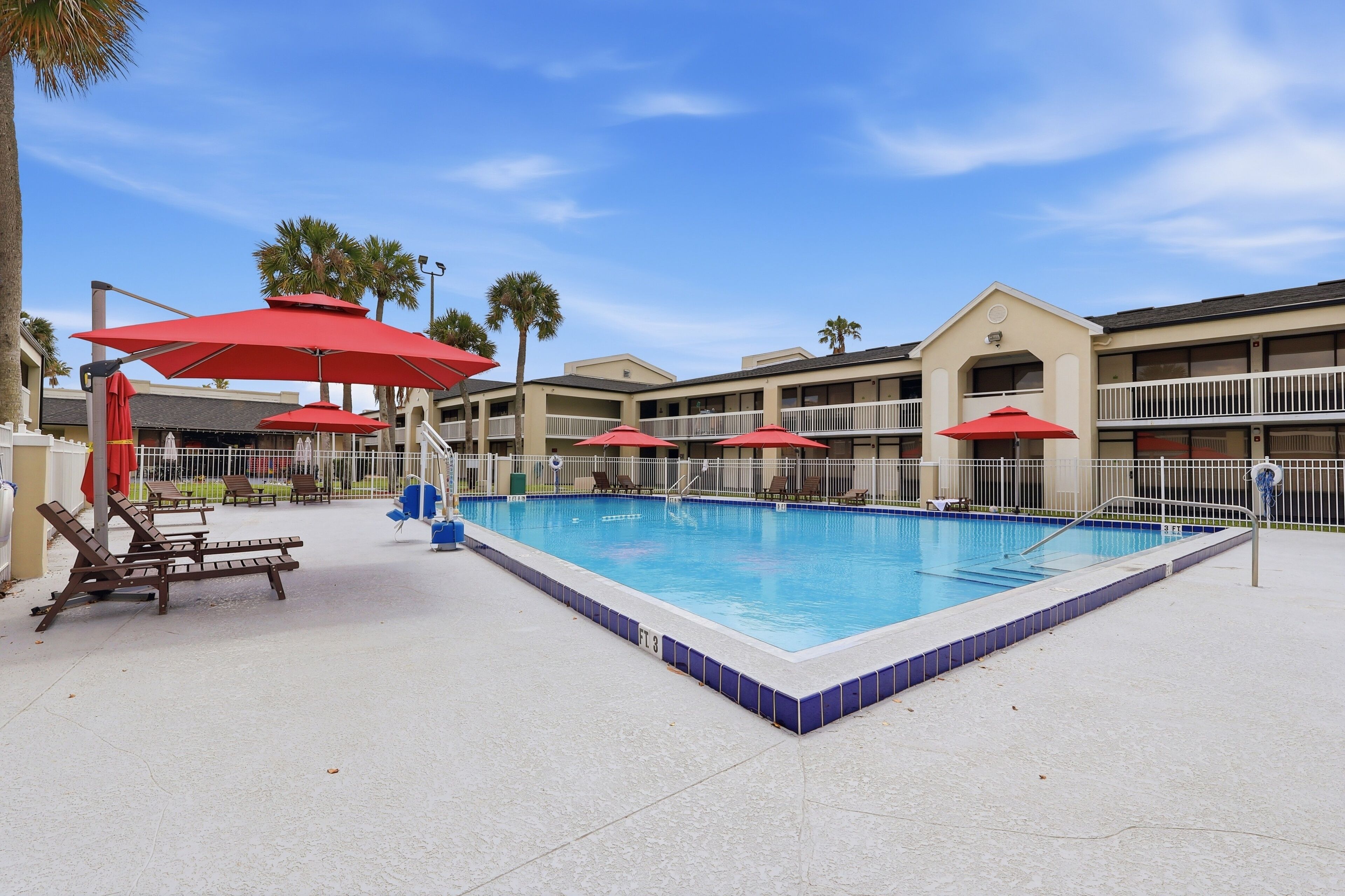 Outdoor pool, pool umbrellas, sun loungers