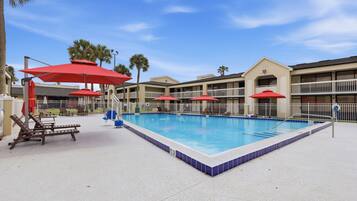 Outdoor pool, pool umbrellas, sun loungers
