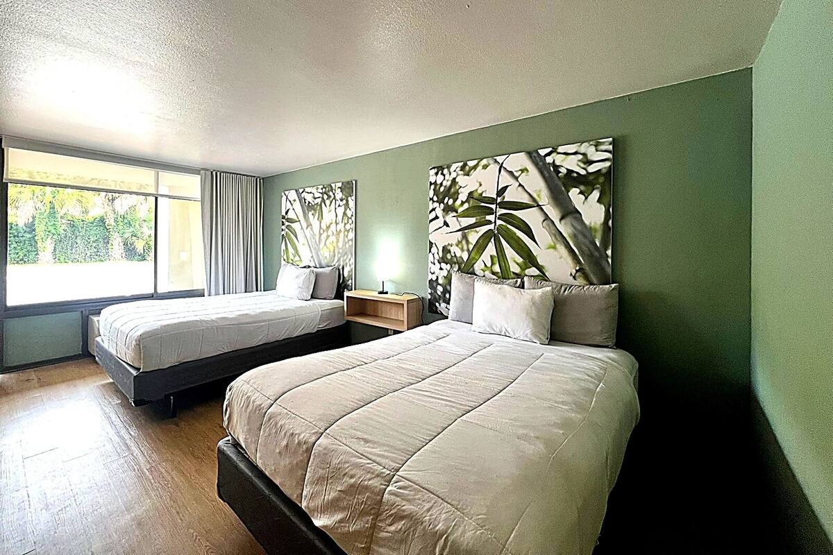 Standard Quadruple Room, 2 Queen Beds, Non Smoking, Refrigerator & Microwave | Minibar, laptop workspace, iron/ironing board, WiFi (free)