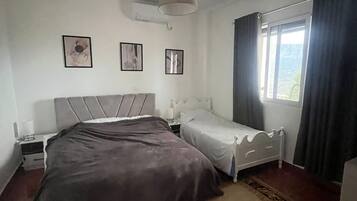 2 chambres, fer et planche à repasser, accès au Wi-Fi (inclus)