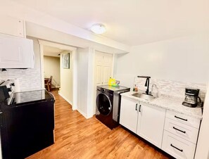 Private kitchen - Elegant 1BR Retreat Near Downtown Relax in Comfort (Dieppe)