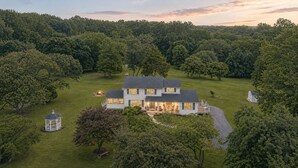 A large house with a spacious lawn, a gazebo, and a well-maintained garden. - Modern Farmhouse: 12.5 Acres & 2 Fire Pits (Lothian)
