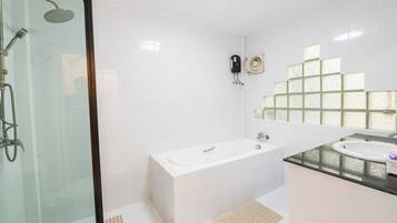 Shower, hair dryer, towels, soap