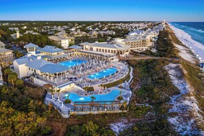 A resort with multiple pools, beachfront views, and a large building complex. - Watercolor Condo w/ Exclusive Pool Access (Santa Rosa Beach)