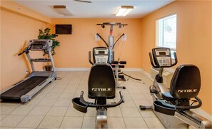 A gym with treadmills, elliptical machines, and weight equipment. - Ocean Ritz 2001! Gulf Views, 4BR Penthouse Beachfront Escape (Panama City Beach)
