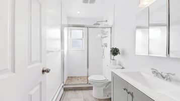 Bidet, towels, soap, toilet paper