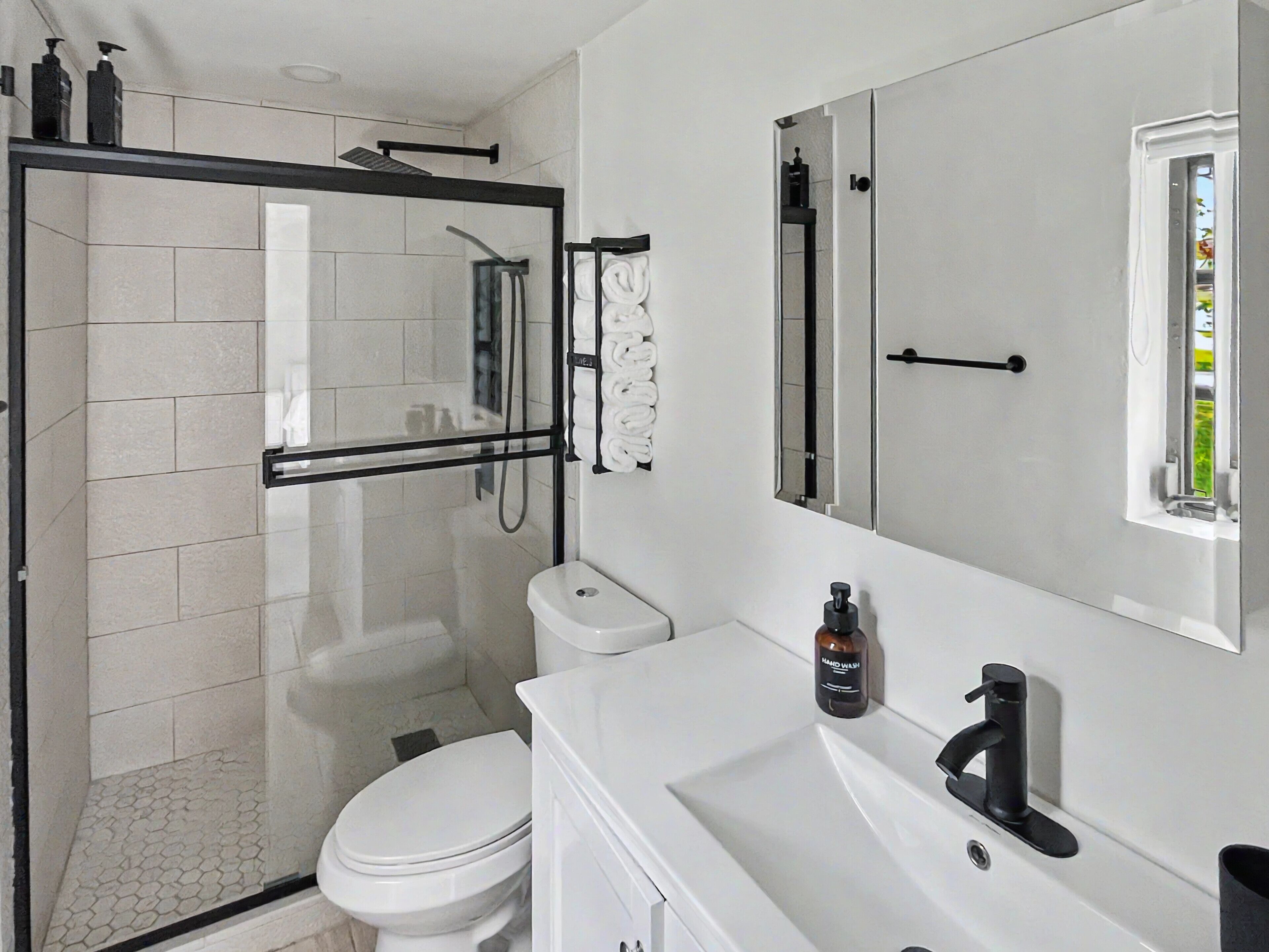 Shower, hair dryer, towels, soap