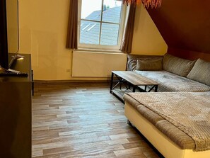 Departamento, vista al patio | Área de sala de estar