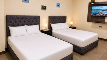 Apartemen Comfort, 2 Tempat Tidur Double, AC, pemandangan halaman | Wi-Fi gratis