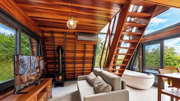 Honeymoon Chalet | Living area | 55-inch Smart TV with digital channels, Netflix, streaming services