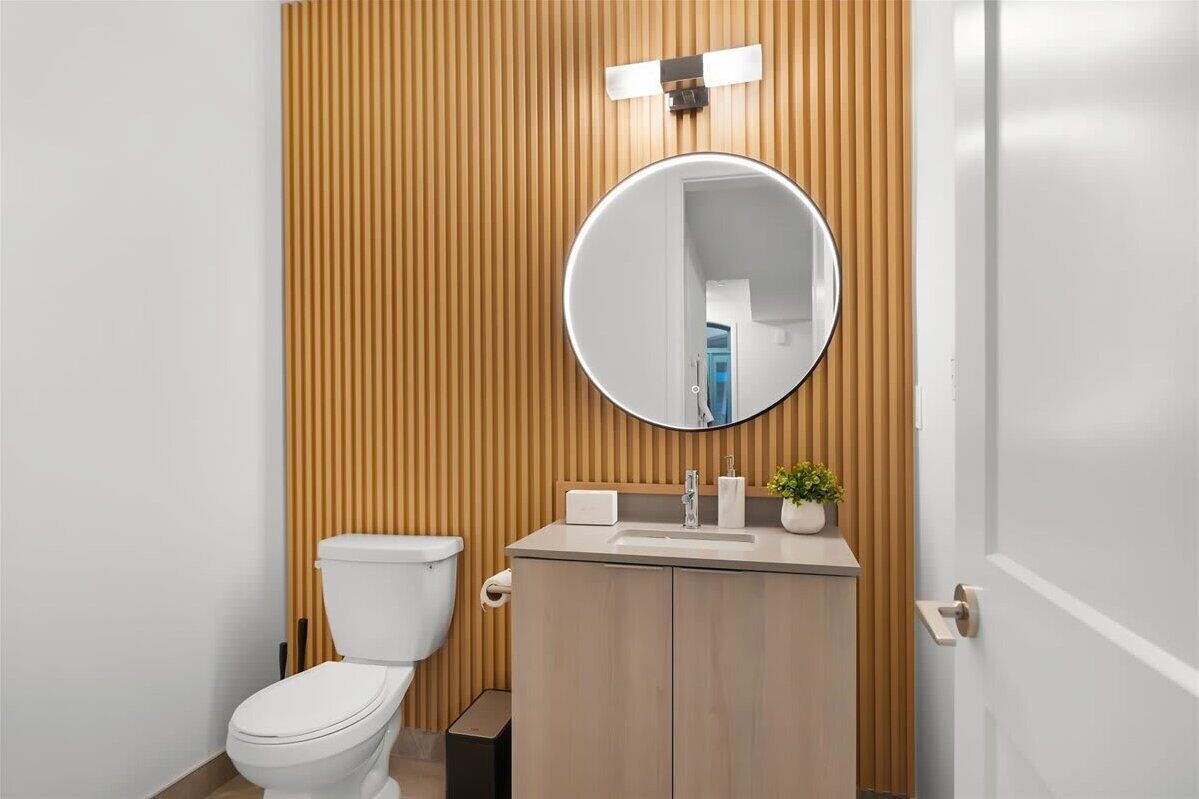 Clean bathroom with fresh towels and essentials