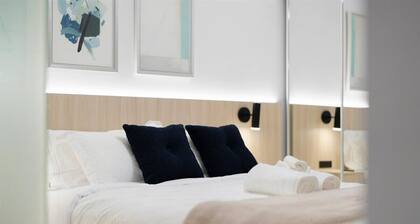 1BR Boutique Lower Suite • Sleeps 4 • Free Parking