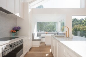 Fridge, microwave, oven, stovetop - Spacious family Hamptons home with creek and bush surrounds, 12 km from city (Ryde)