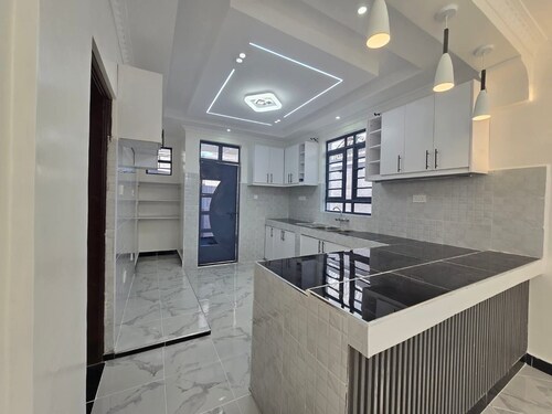 Cozy 2-bedroom bungalow with AC in charming Nairobi