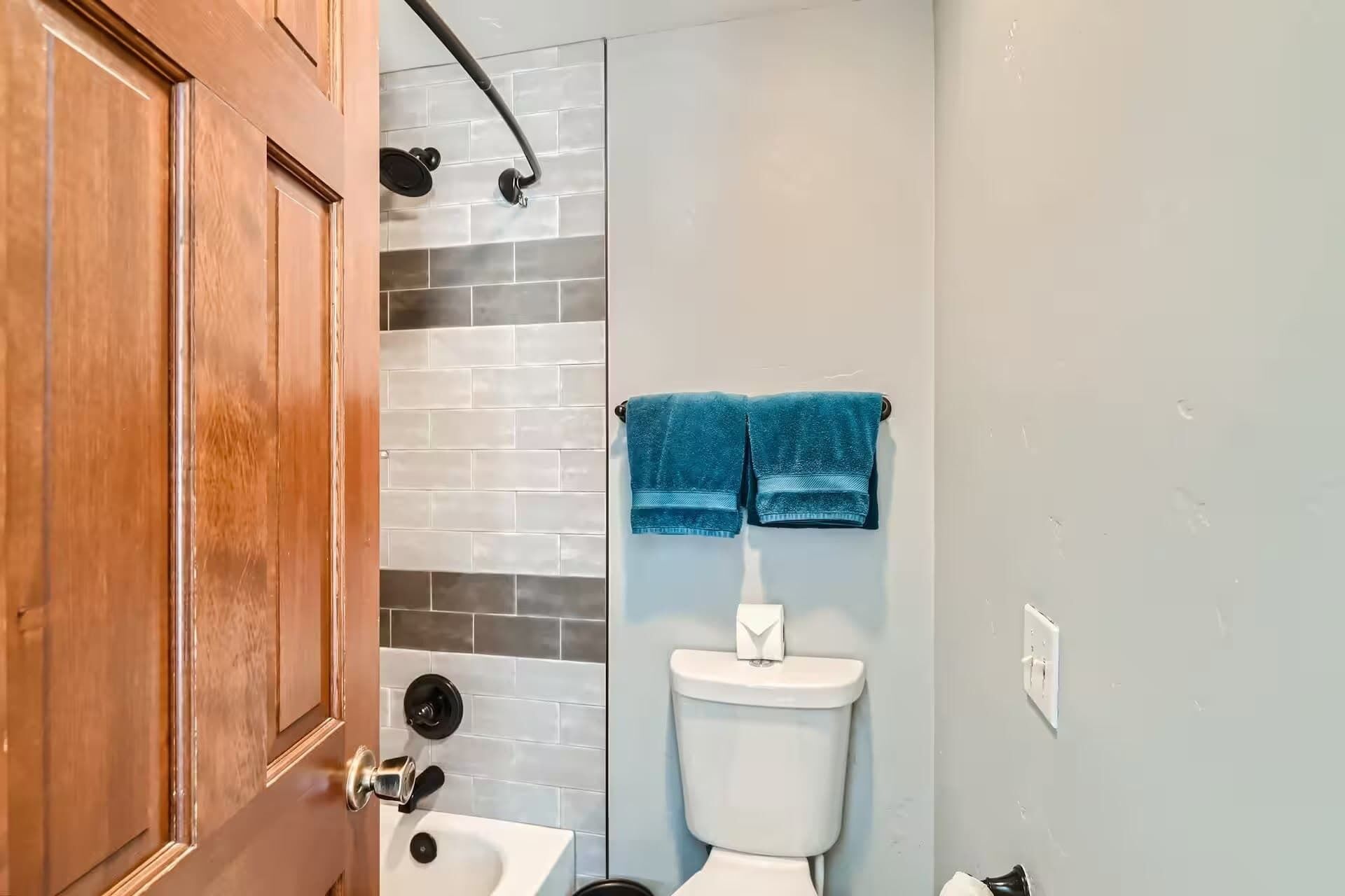 Shower, hair dryer, towels, shampoo