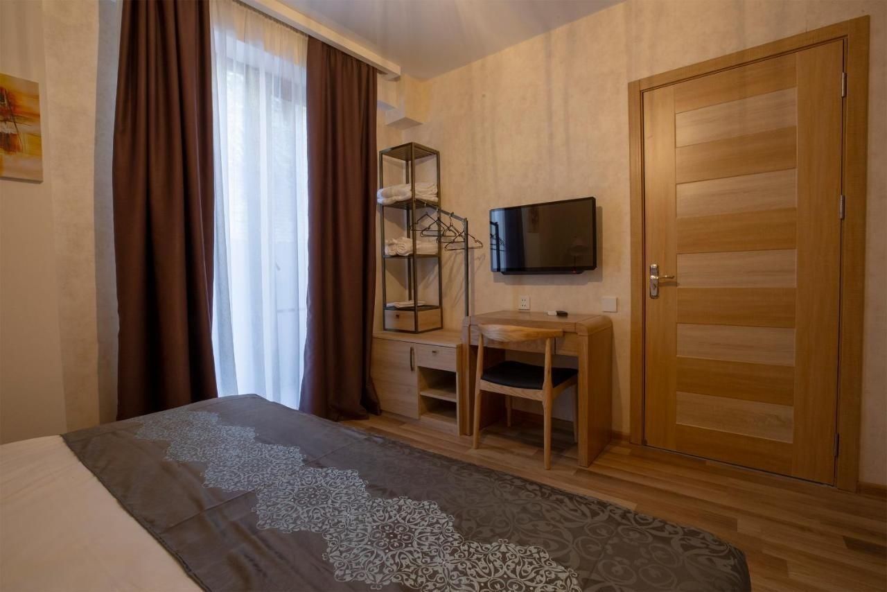 Chambre Double ou avec lits jumeaux, patio, vue ville