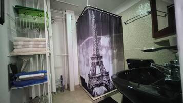 Shower, towels, soap, toilet paper