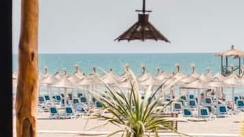 Economy Bungalow, Balcony, Beach View | Outdoor dining