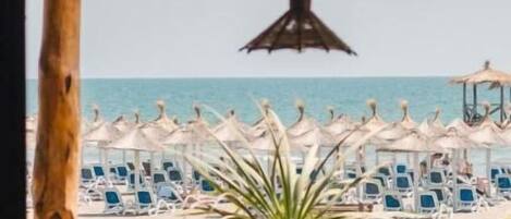 Economy Bungalow, Balcony, Beach View | Outdoor dining