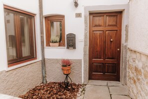 A house with a wooden door, a window, and a mailbox. - Ready to experience Italy in close proximity, sea, lakes and rivers? (Casciana)