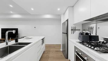 Coffee/tea maker, fridge, microwave, oven