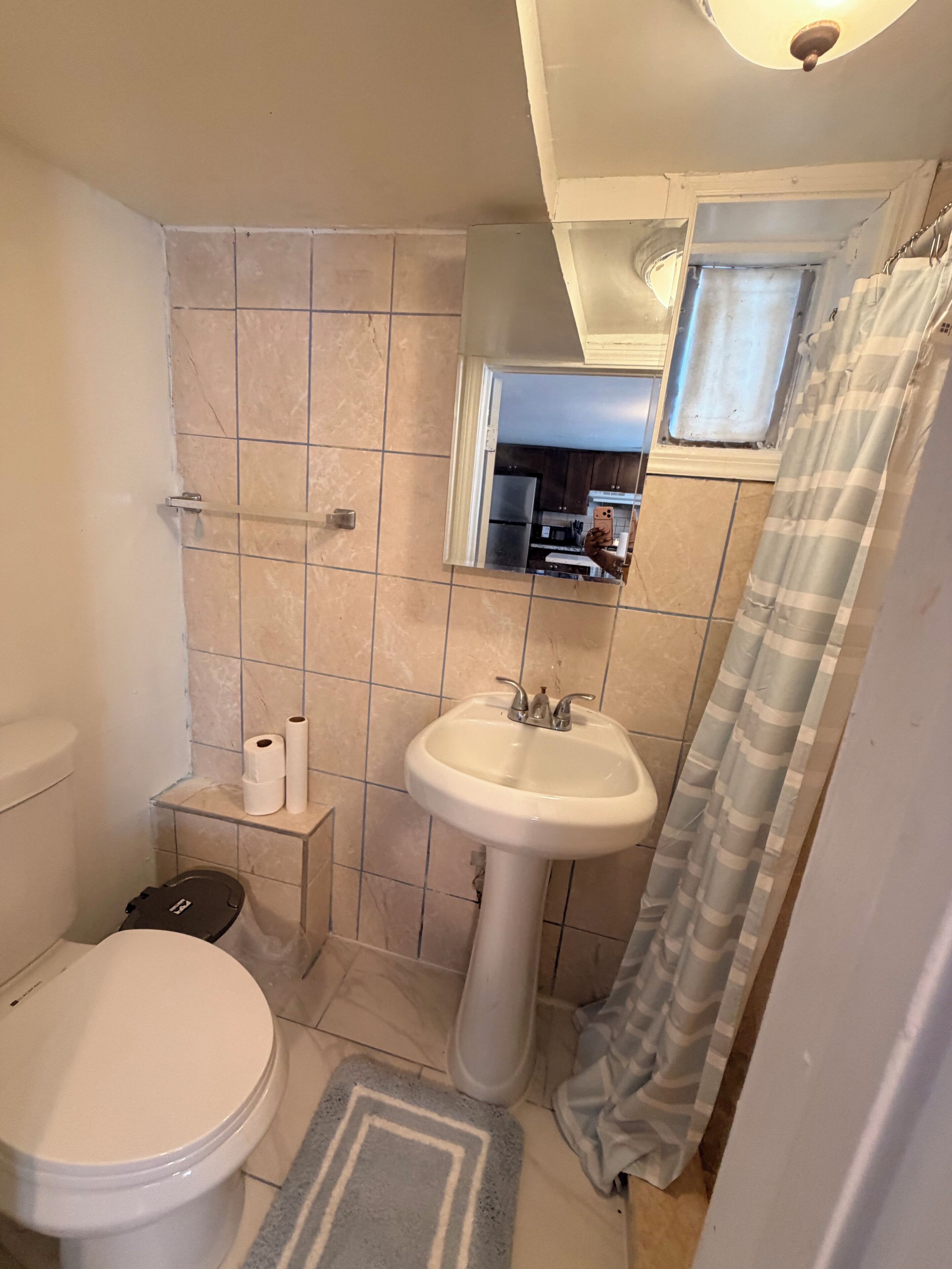 Shower, towels, soap, toilet paper