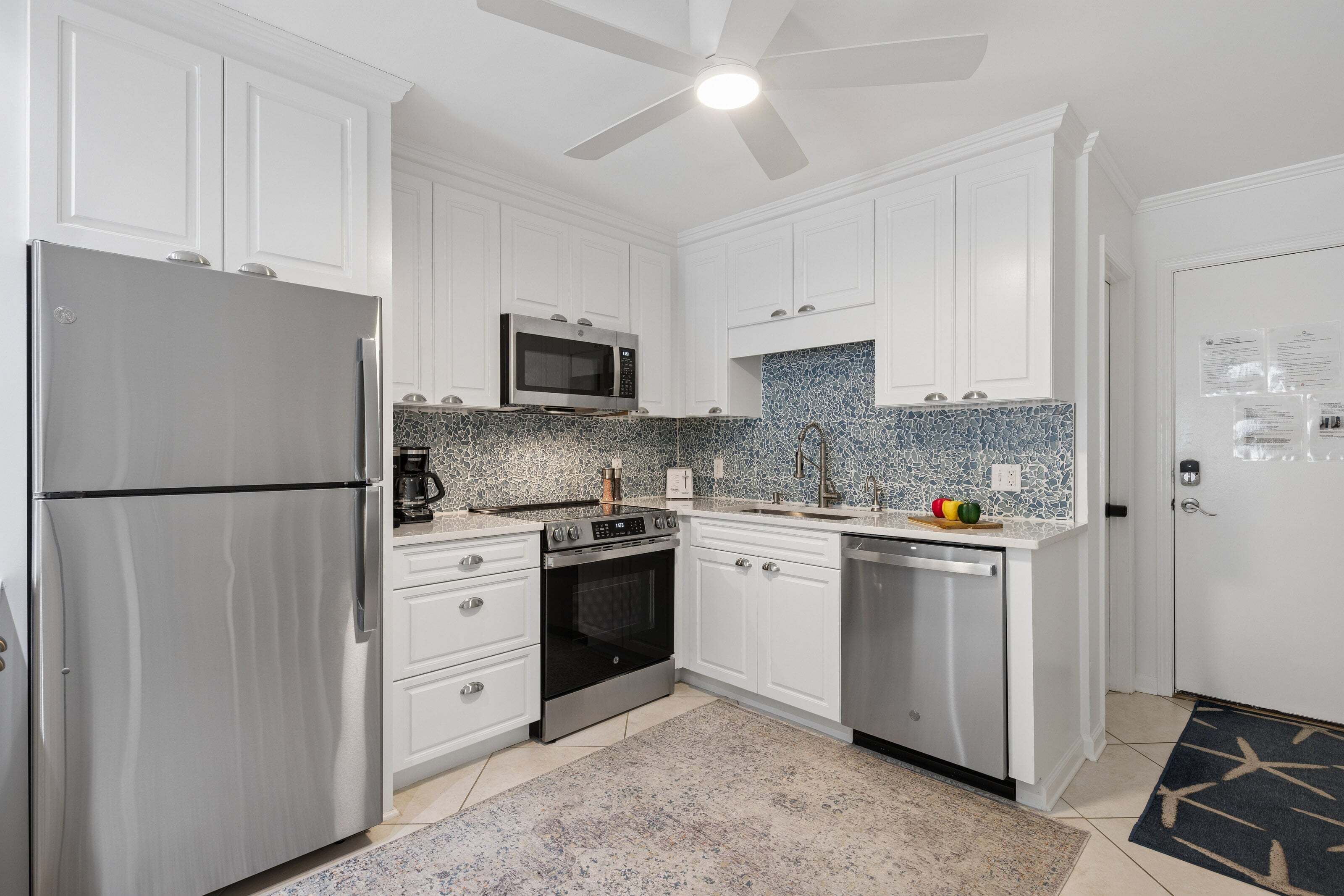 The fully equipped kitchen offers everything needed for effortless vacation dining, from quick breakfasts before the beach to relaxed dinners after island adventures.