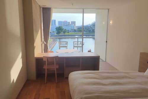 Basic Twin Room, River View | In-room safe, desk, free WiFi, bed sheets