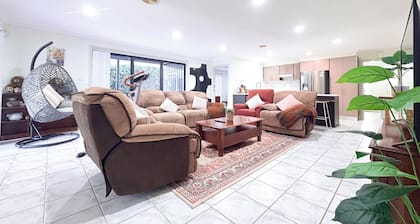 Spacious 4BR Family Retreat with Cozy Lounge