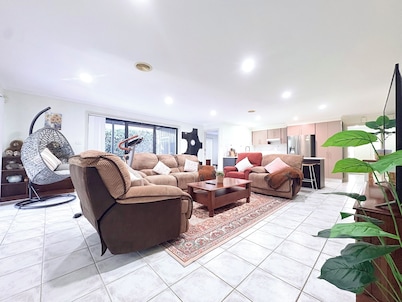 Spacious 4BR Family Retreat with Cozy Lounge