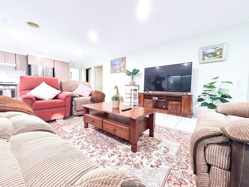 Spacious 4BR Family Retreat with Cozy Lounge