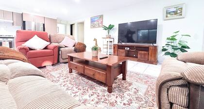 Spacious 4BR Family Retreat with Cozy Lounge