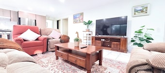 Spacious 4BR Family Retreat with Cozy Lounge