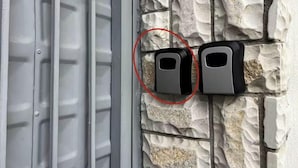 A wall-mounted intercom system and a door with a metal frame. - Dajti National Park House, Sleeps 7 with AirCon (Tirane)