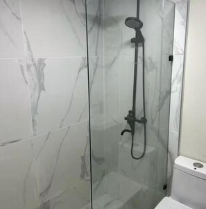 Shower, hair dryer, towels, soap - Solano Apartments (Boca Chica)