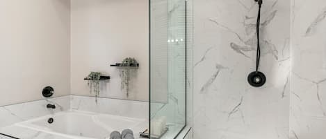 Jetted tub, hair dryer, towels, soap
