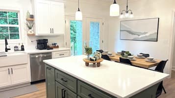 Coffee/tea maker, fridge, microwave, oven