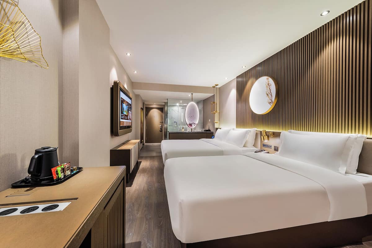 Comfort Triple Room | Minibar (free items), laptop workspace, WiFi (free), bed sheets