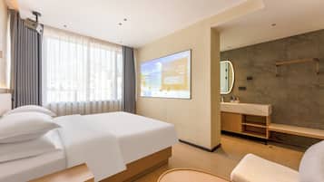Premium bedding, memory foam beds, desk, laptop workspace