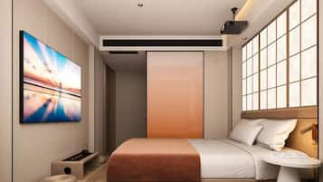 Premium bedding, memory-foam beds, desk, laptop workspace